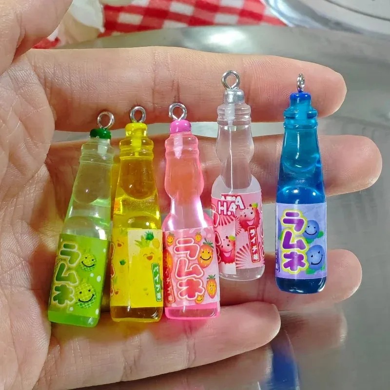 Resin Art Notes - 10 Breloques en résine en forme